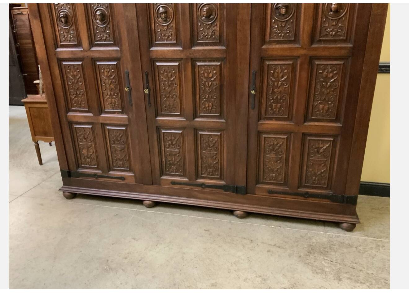 Antique neo-Gothic wardrobe with linen drawers.
