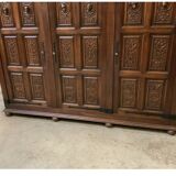 Antique neo-Gothic wardrobe with linen drawers.