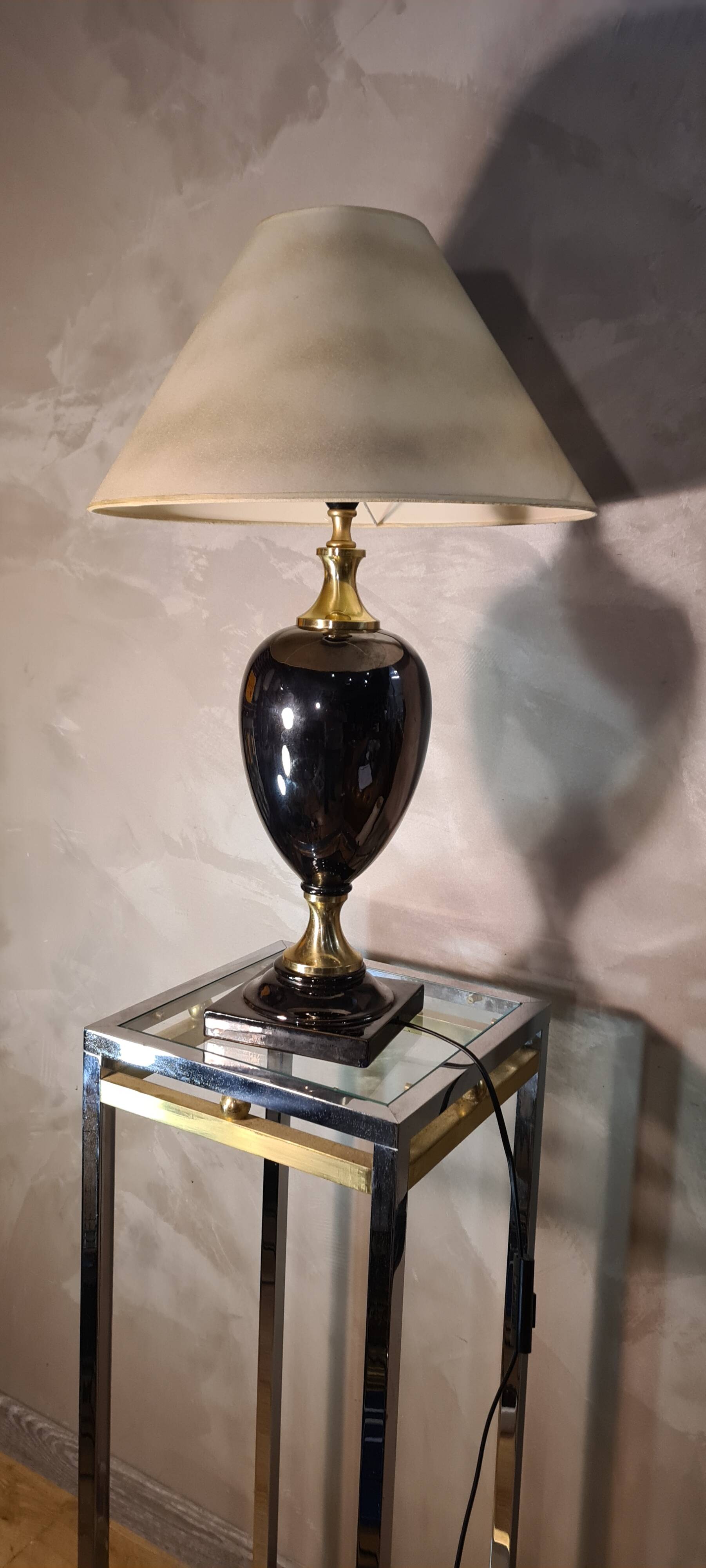 black glazed and gold ceramic lamp