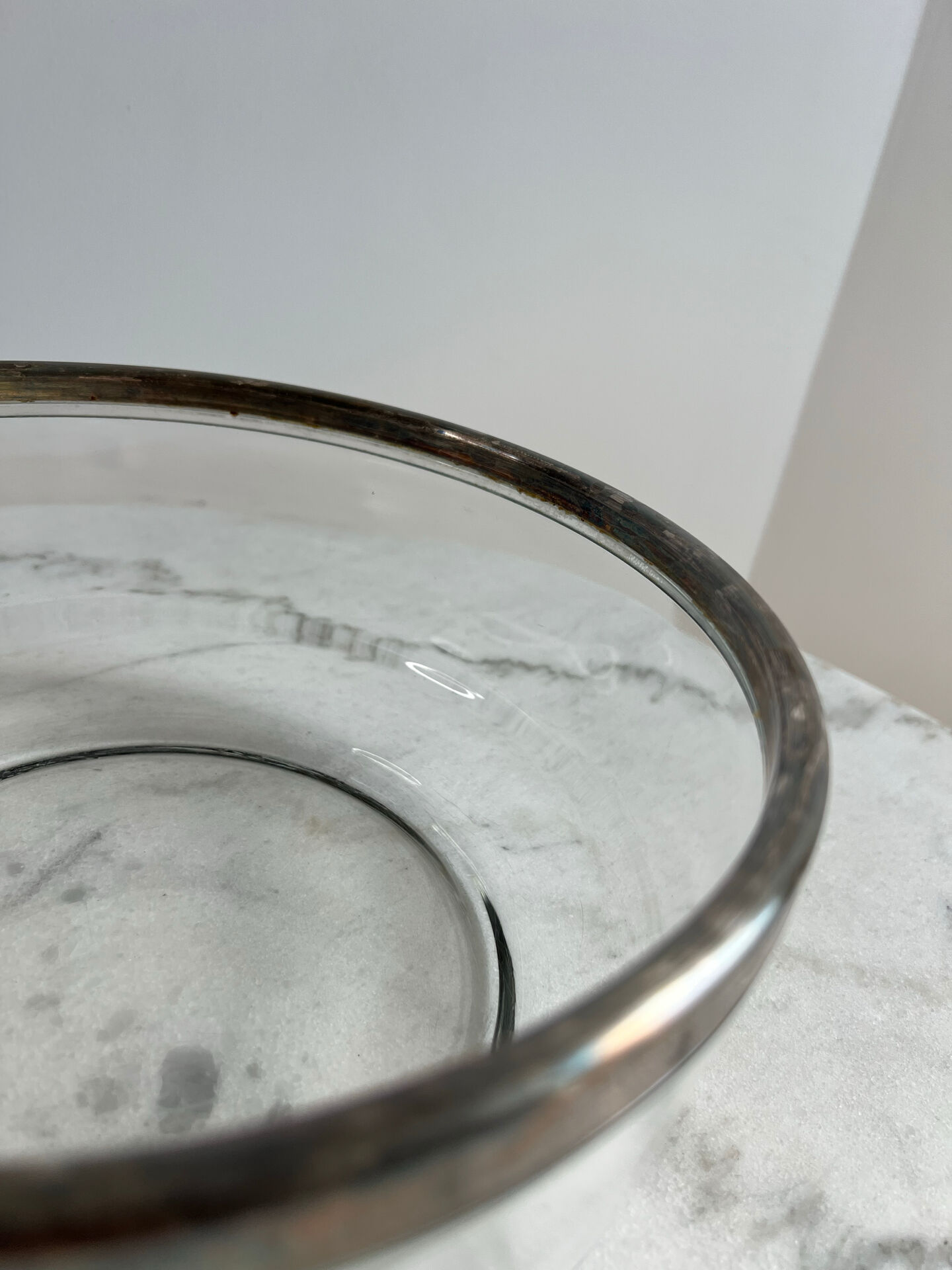 Glass and silver-plated metal salad bowl, silver rim.