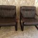 Pair of vintage armchairs in curved wood with suspended seat circa 1970-80.