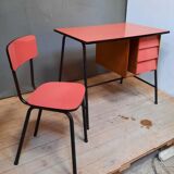 Red vintage desk and its chair