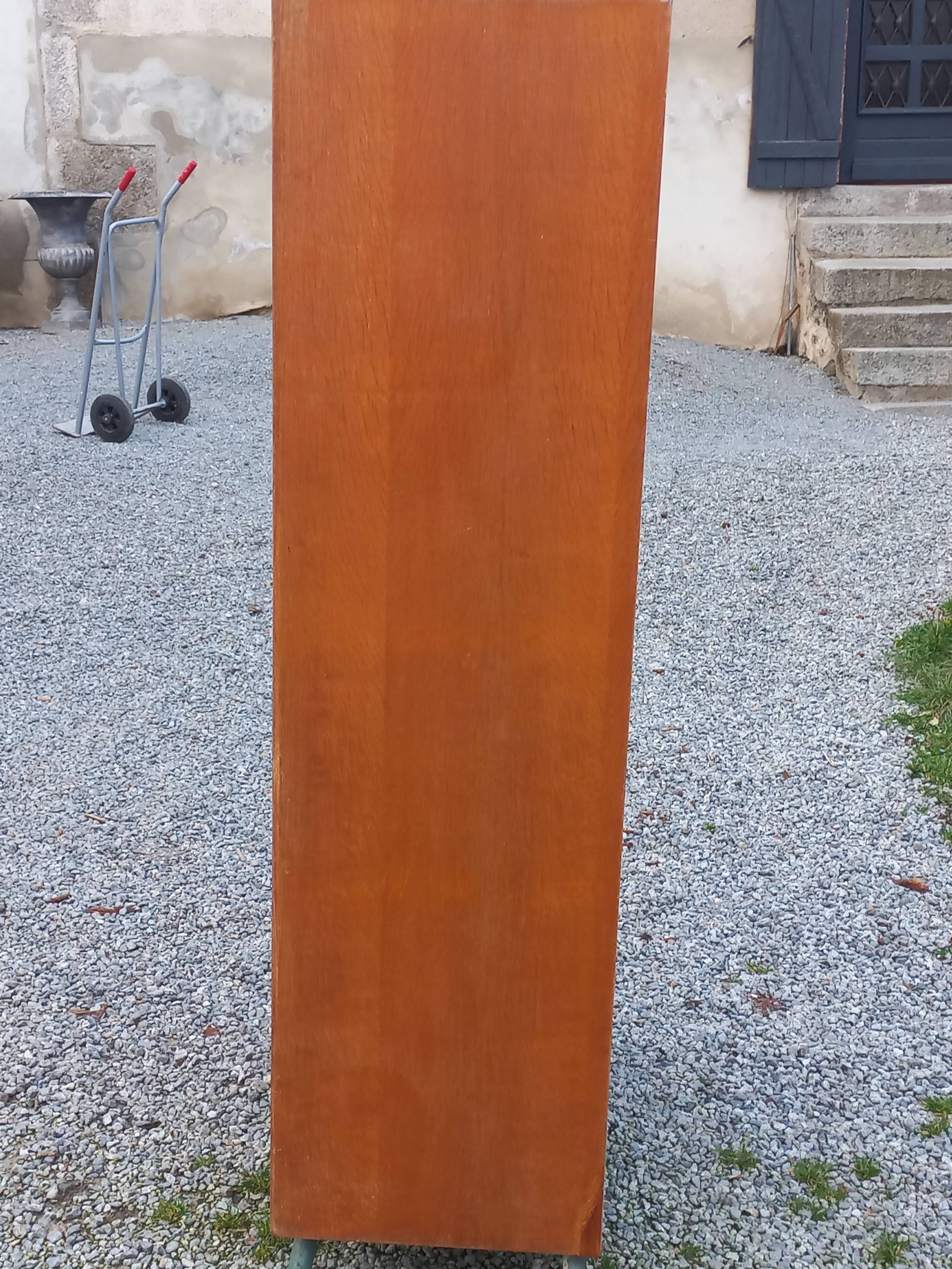 Vintage oak wardrobe with metal legs from the 1950s.