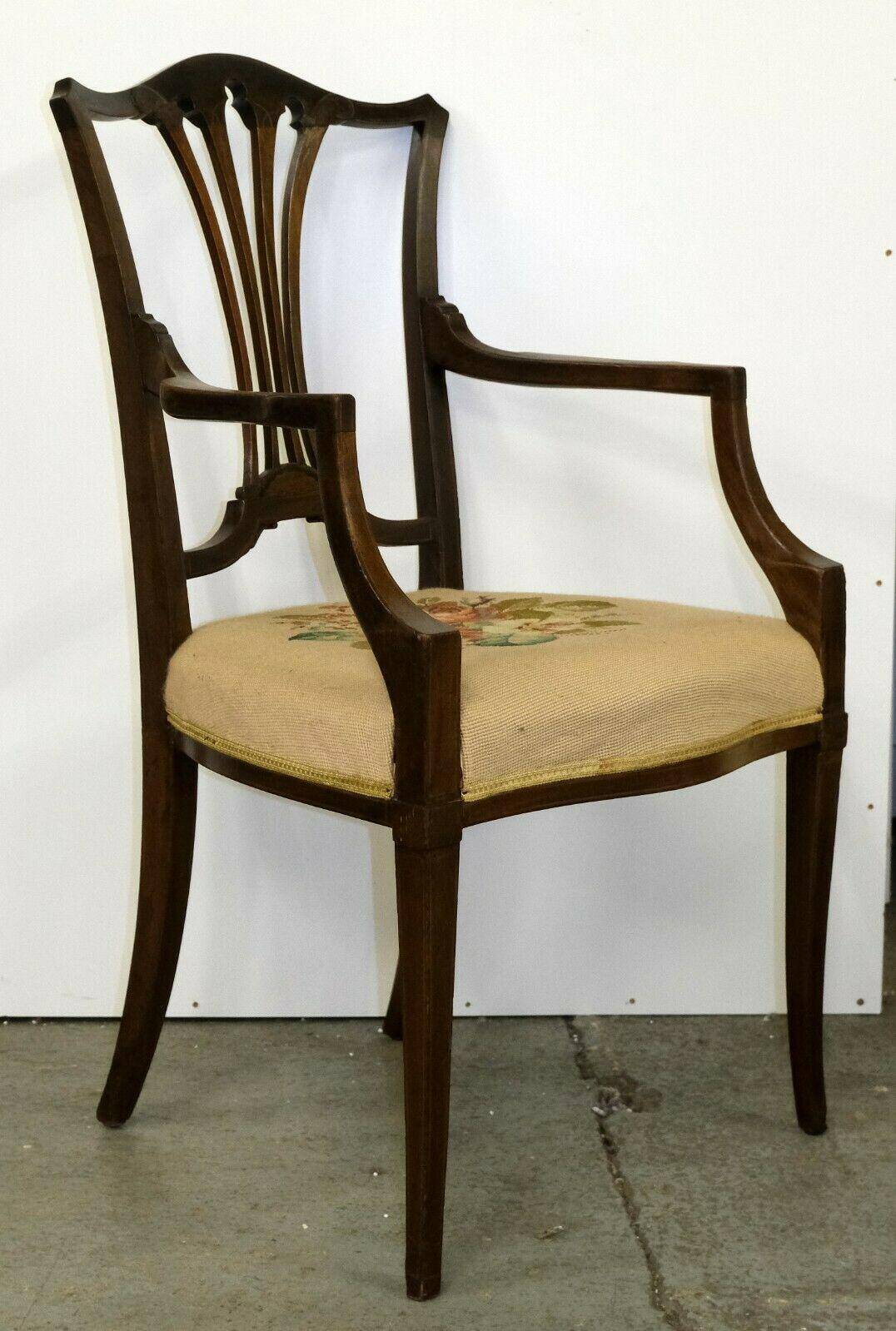 Hepplewhite armchair in hardwood on delicate legs with original seat.