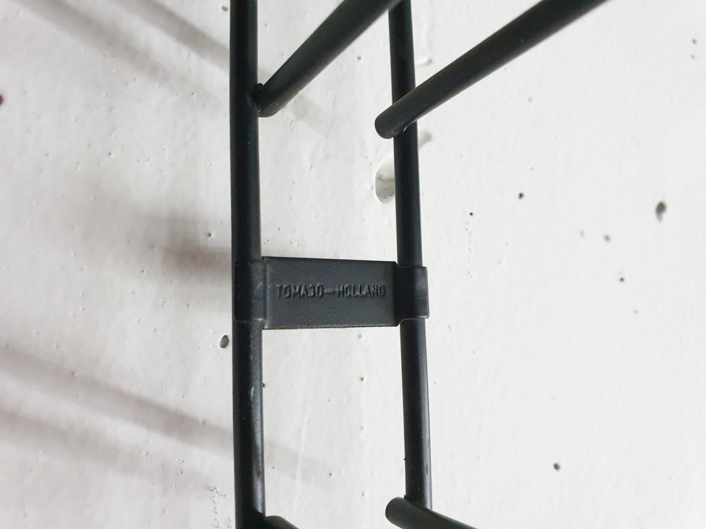 Red and black metal book shelves by Tomado, The Netherlands 1950's