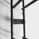 Red and black metal book shelves by Tomado, The Netherlands 1950's