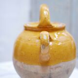Old gargoulette pot in glazed terracotta