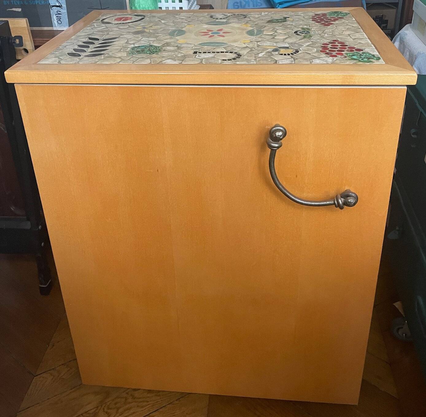 New oak storage furniture with a signed artisanal mosaic top.