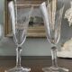 2 antique blown glass champagne flutes, tulip shape.