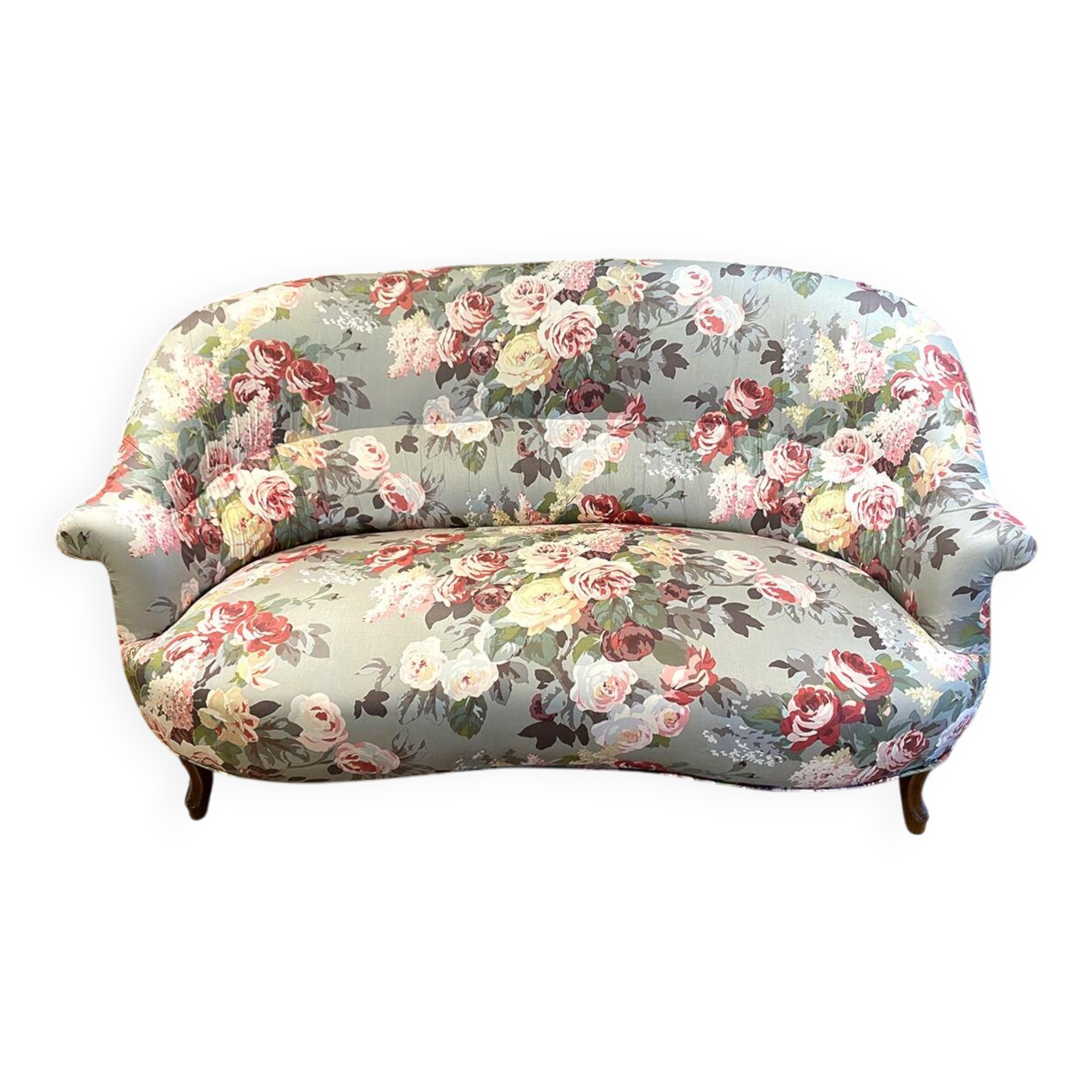 Napoleon III sofa upholstered in a floral patterned fabric
