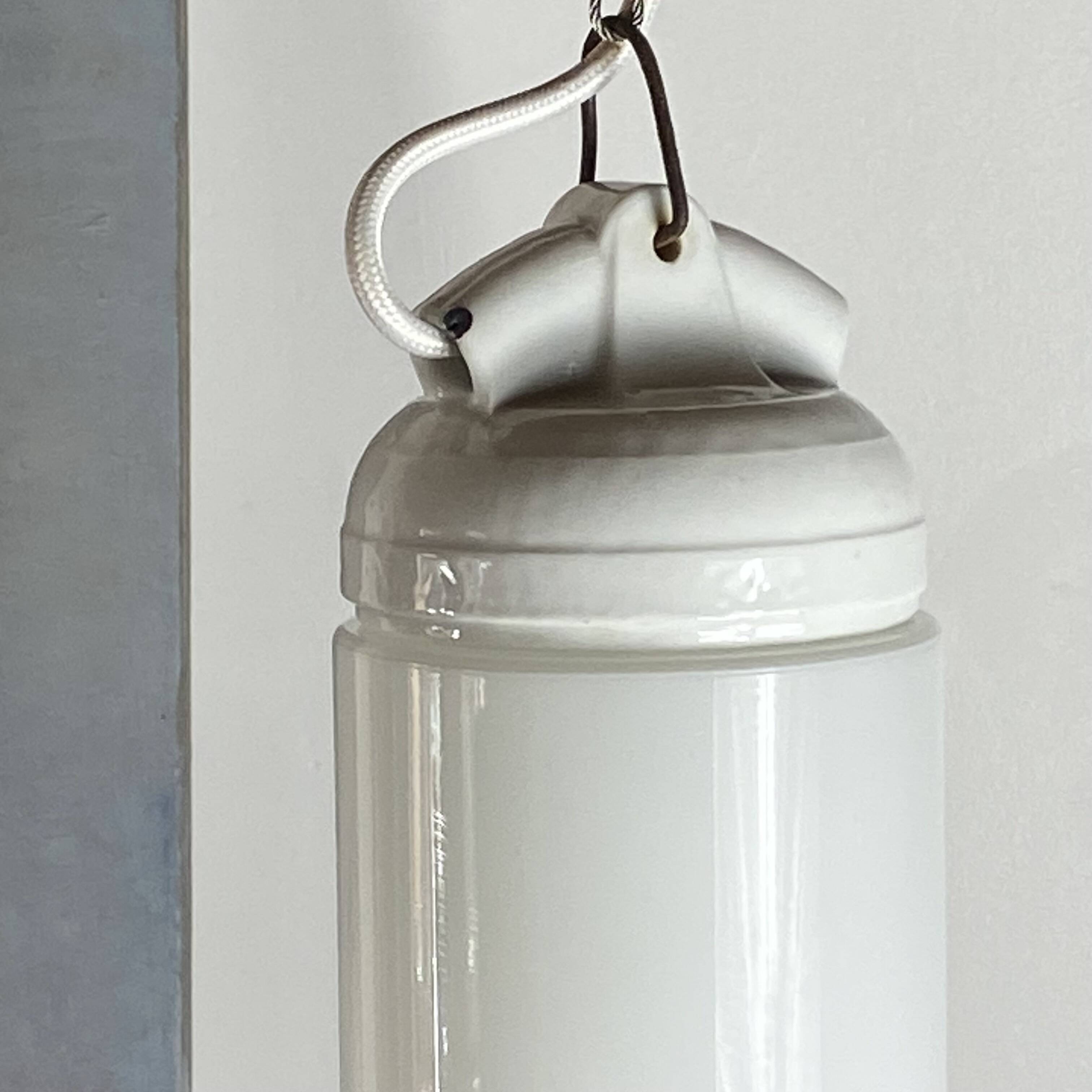 Industrial suspension in white glass and porcelain, vintage model.