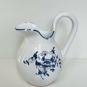 Moustiers pitcher with blue floral decoration