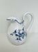 Moustiers pitcher with blue floral decoration