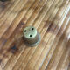 Vintage brass candelabrum engraved with three lights and a snuffer.