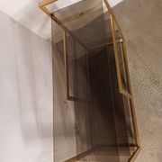 Brass shelf, smoked glass