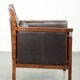 Art Deco design armchair with dark brown cowhide upholstery