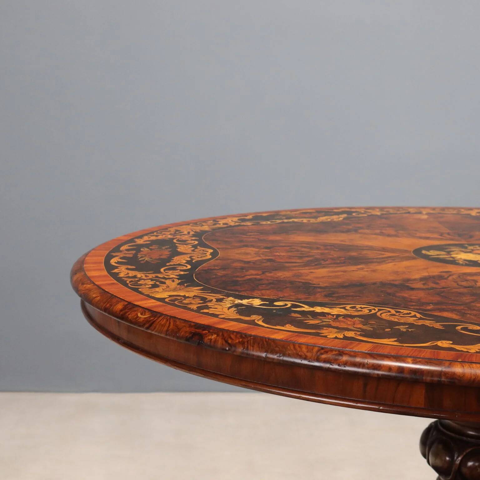 Antique walnut and rosewood table with floral inlays, Netherlands, 19th century.