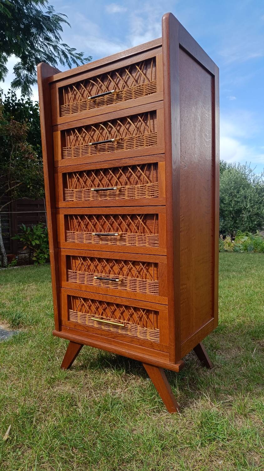 Tall chest of drawers in wood and rattan with splayed legs