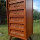 Commode haute bois et rotin pieds compas