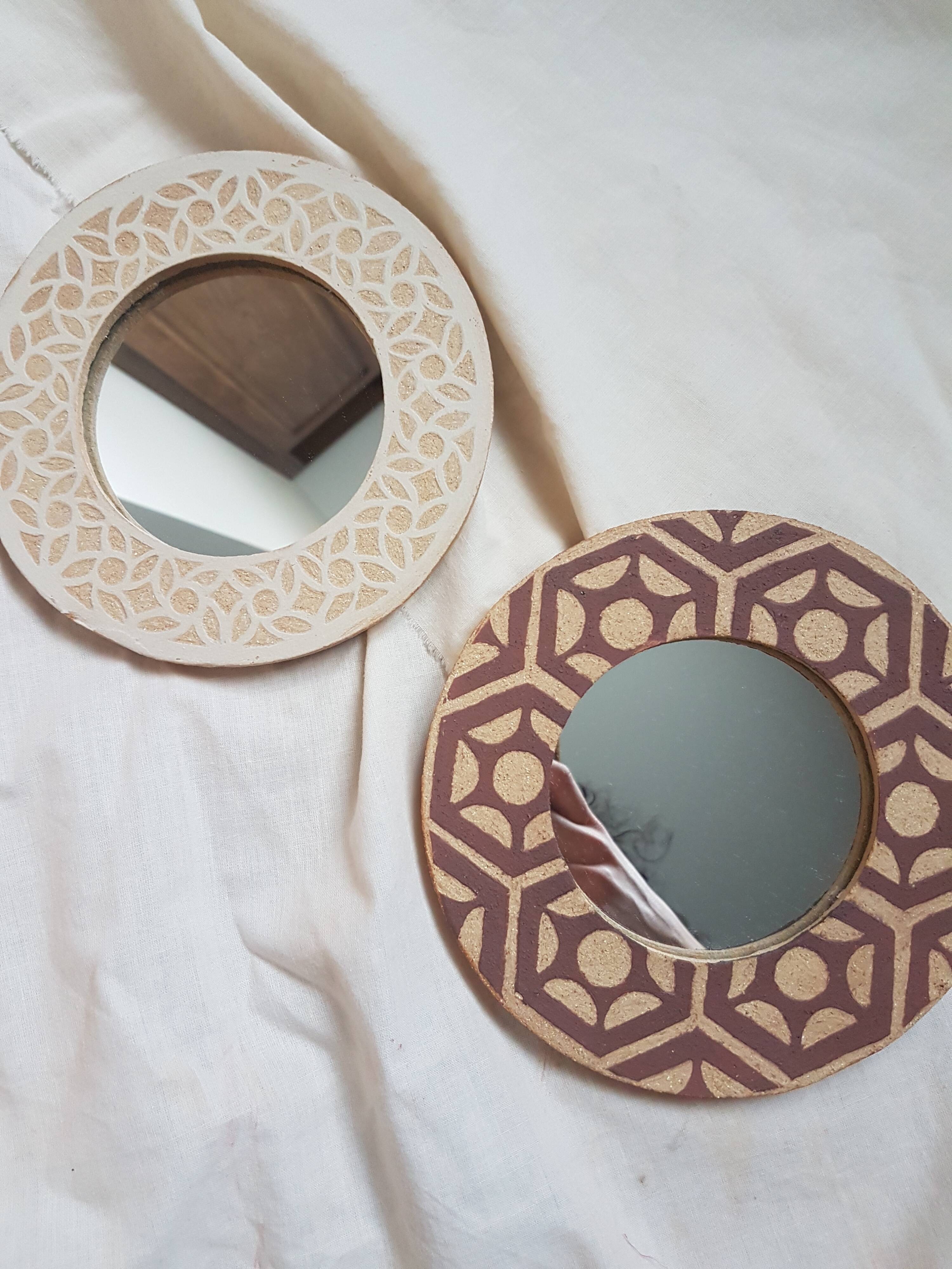 Stoneware mirror with sgraffito decoration