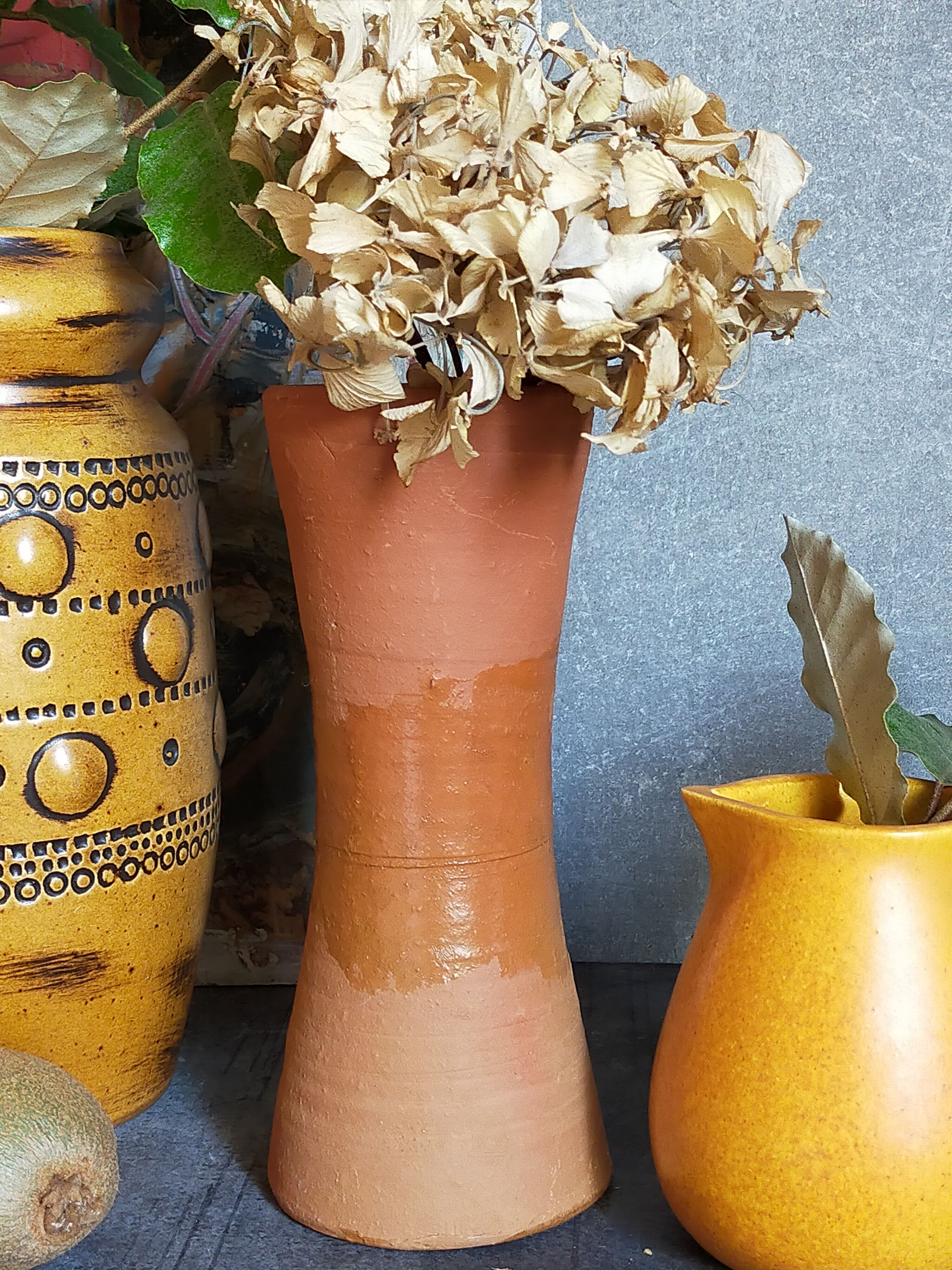 Potter's "Diabolo" vase in vintage glazed terracotta