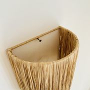 Raffia wall lamp
