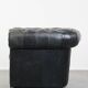 Black cowhide leather chesterfield armchair