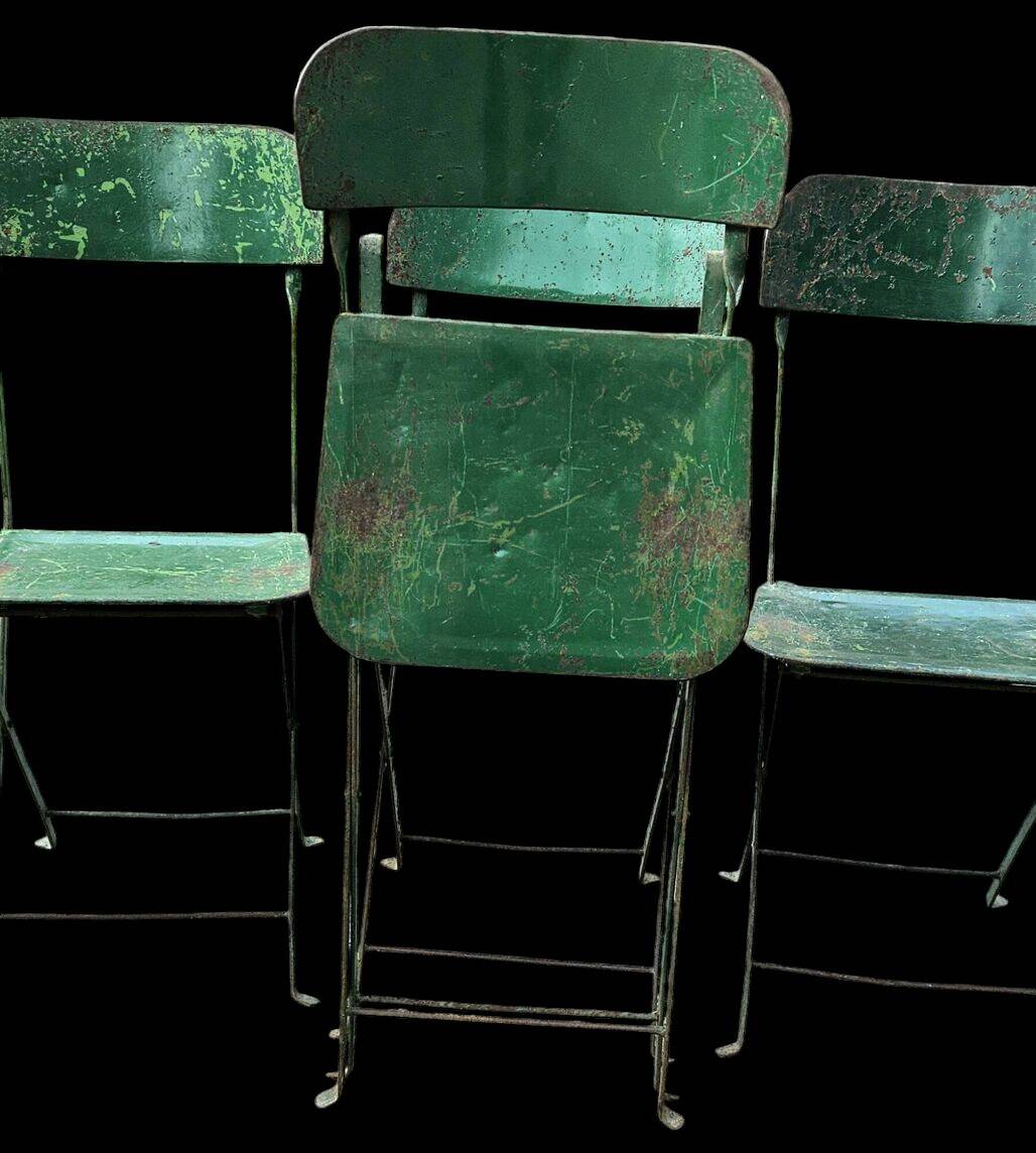 Set of 8 industrial folding chairs in green painted metal