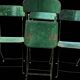 Set of 8 industrial folding chairs in green painted metal