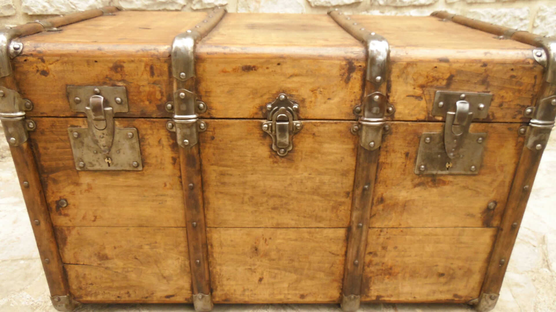 Former large wooden and iron trunk