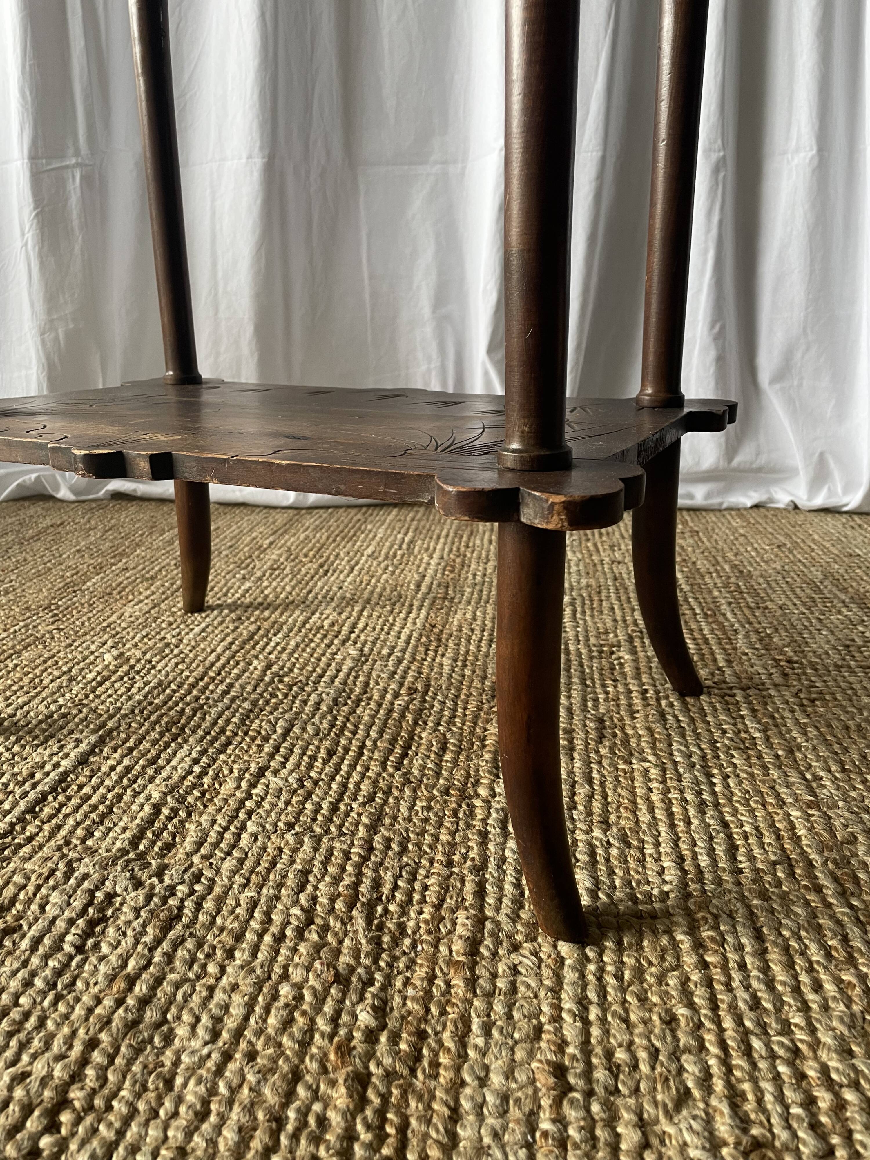 Elegant Art Nouveau side table in walnut, France early 20th century.