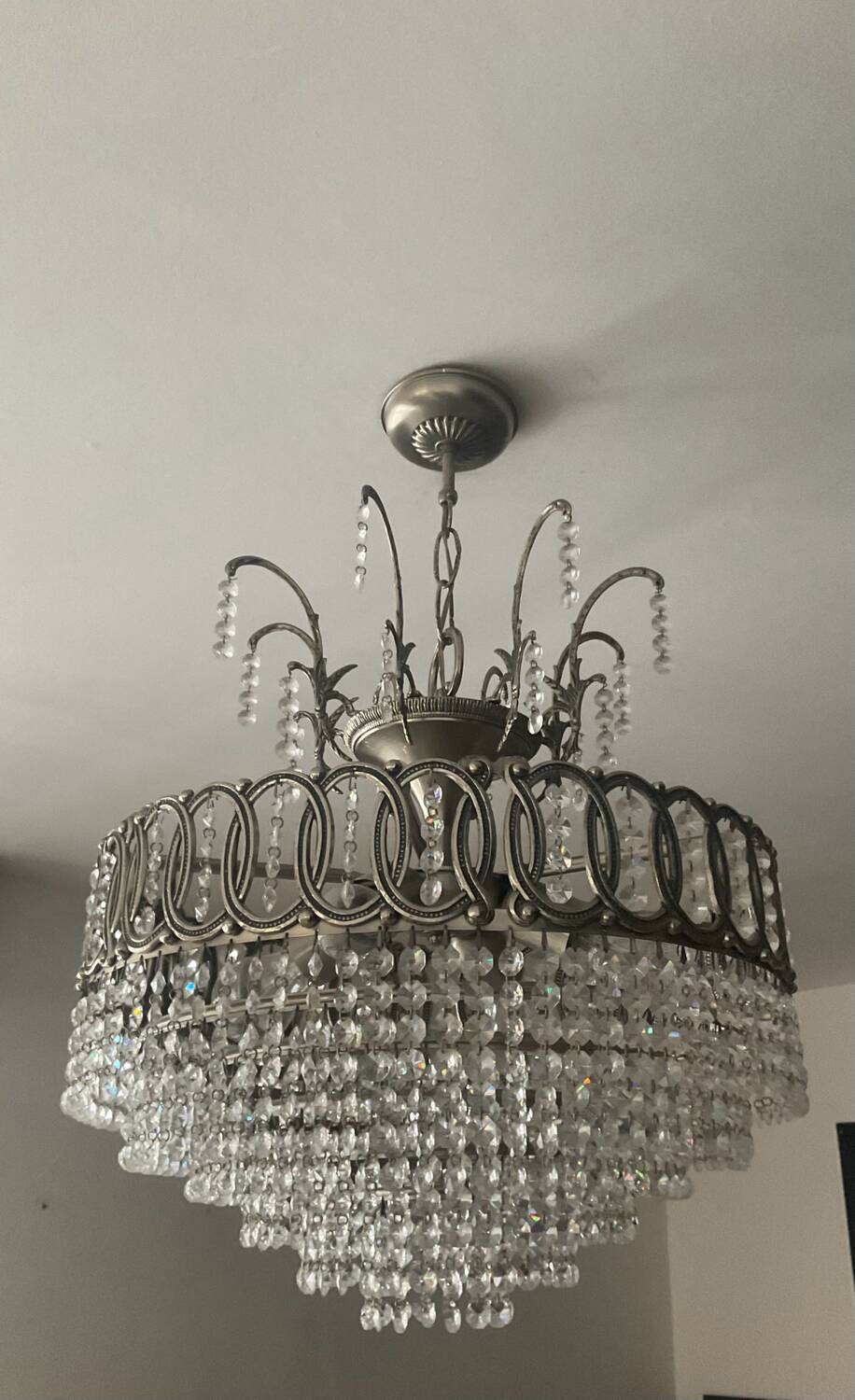Cascading chandelier with crystal and silvered bronze pendants