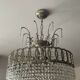Cascading chandelier with crystal and silvered bronze pendants