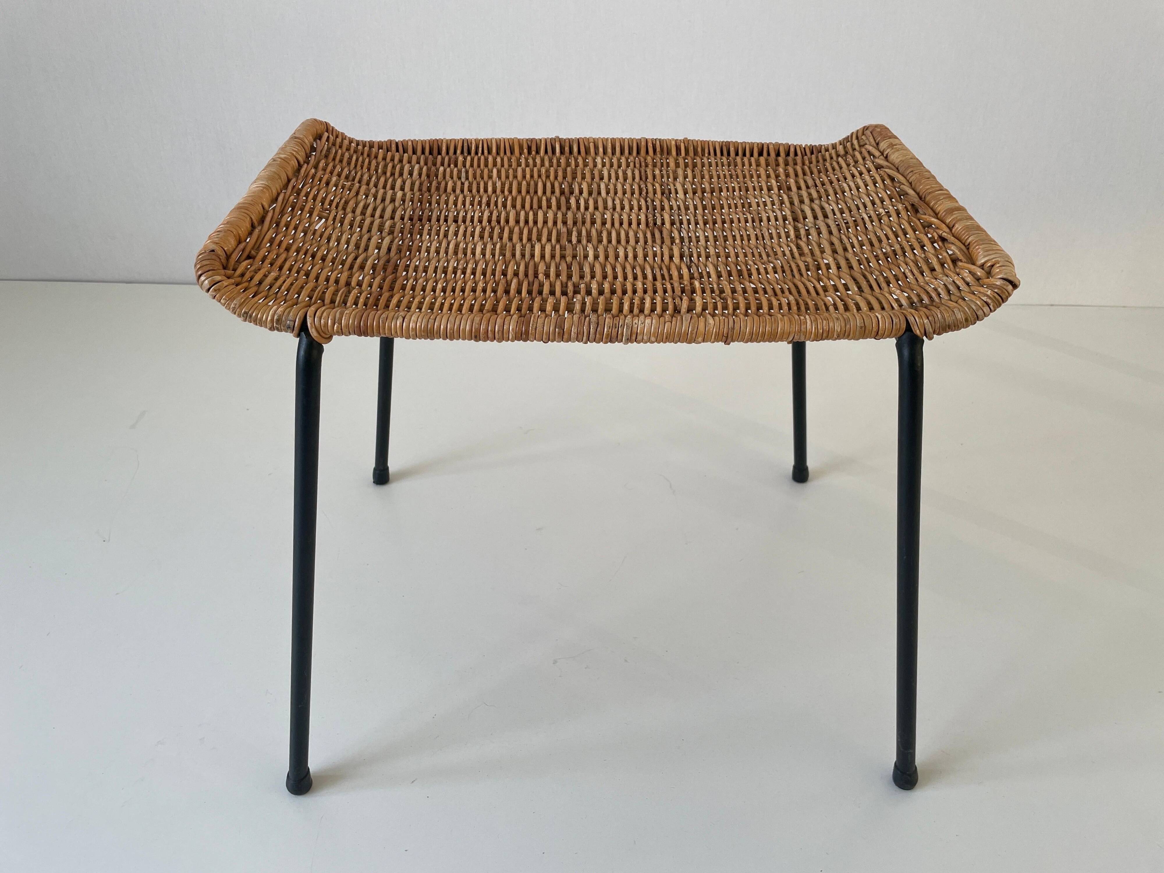 Wicker armchair and footrest, Germany, 1960s