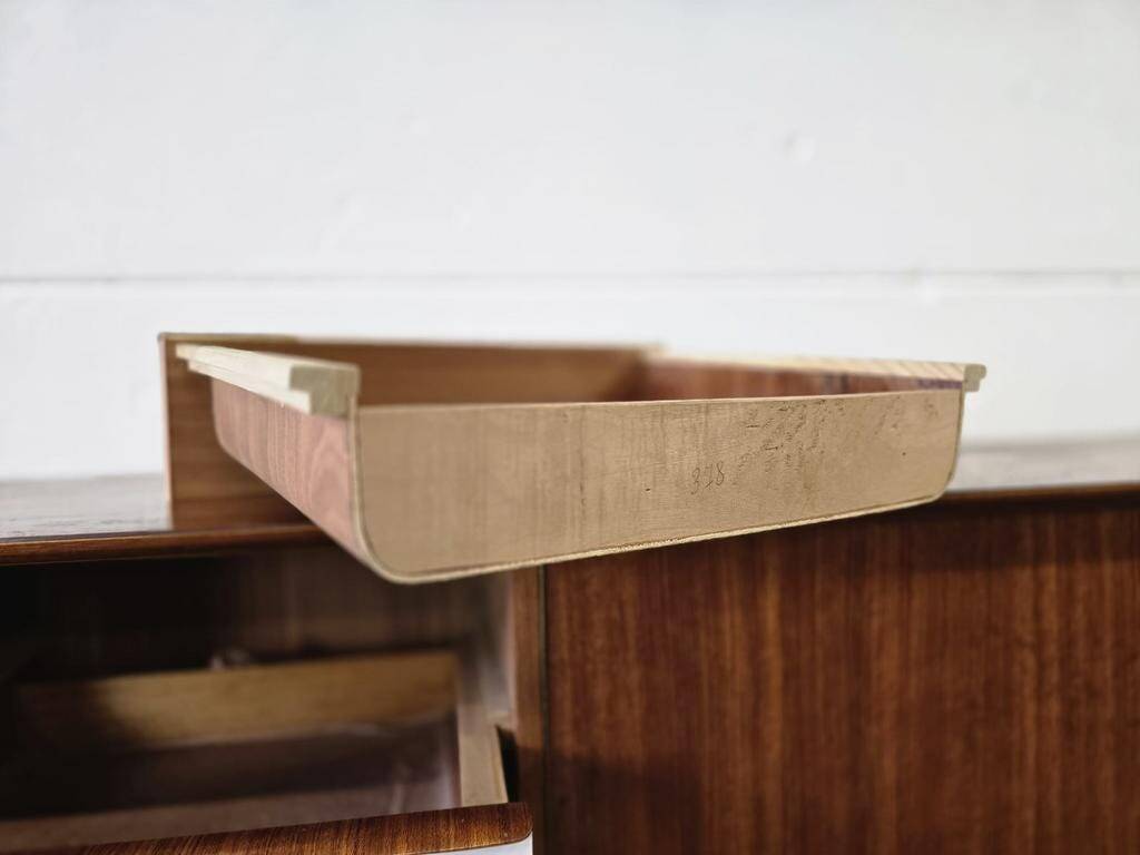 Vintage wooden sideboard with white formica drawers