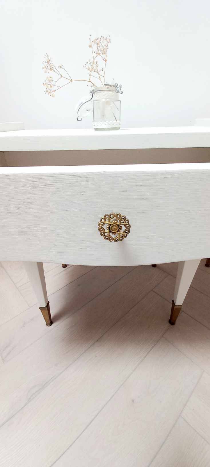 Vintage bedside table with compass foot