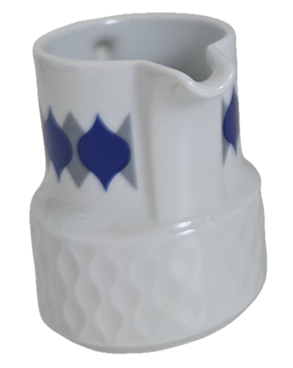 Vintage Schirnding Bavaria coffee pot and milk jug, blue geometric pattern.