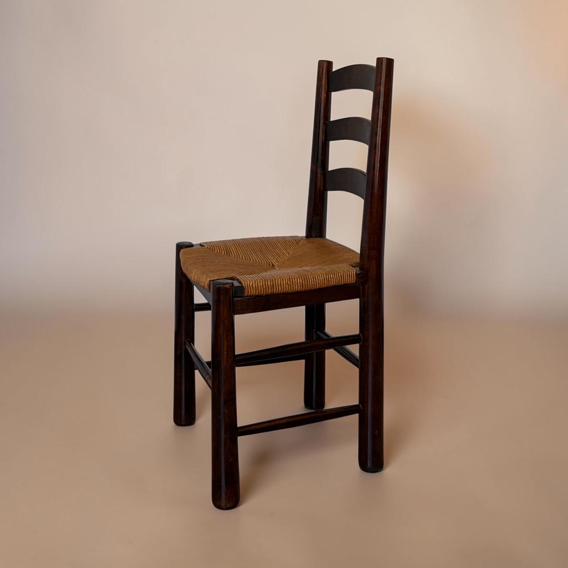 Rustic chairs attributed to Georges Robert.