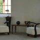 Vintage Indian teak coffee table inlaid with elephant motifs, mid-20th century.