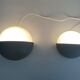 Round black metal wall lights, small and large set, by Bega, 1970s, Germany.