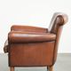 Timeless armchair made of sheepskin leather with a English look