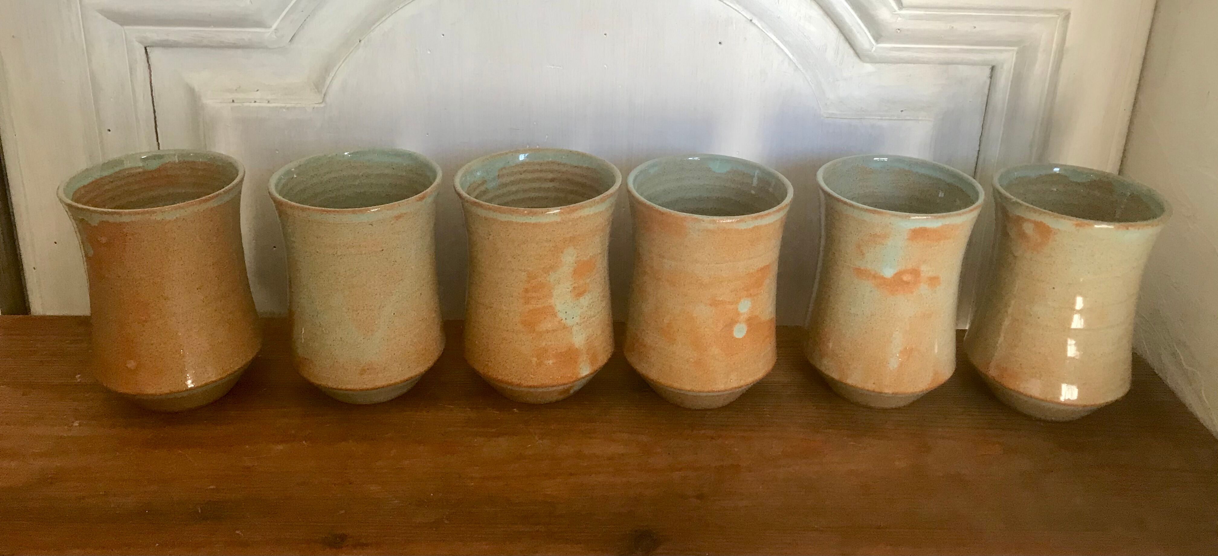 Pitcher and its vintage sandstone glasses