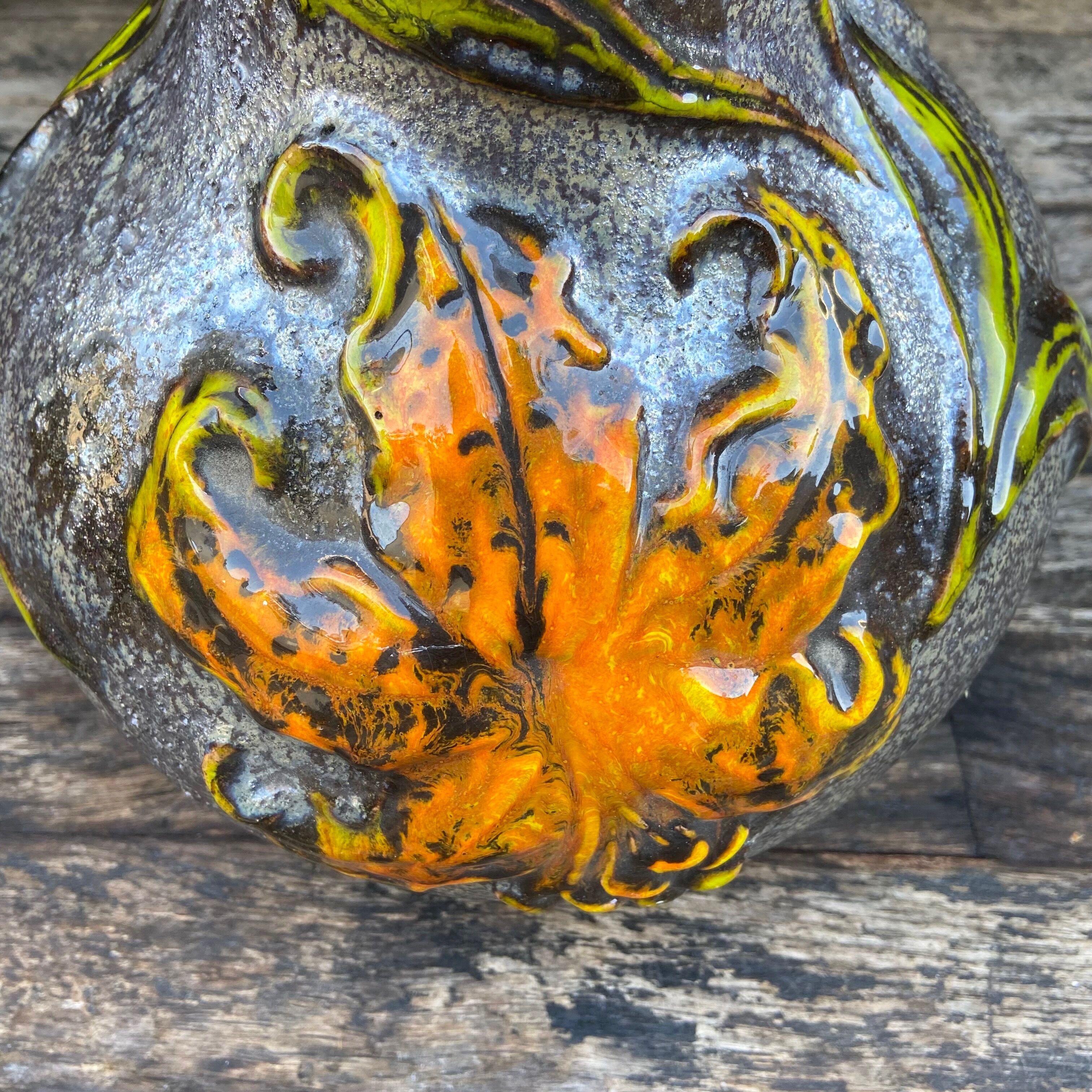 Vintage enamelled ceramic laying vase