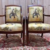 Pair of 19th-century armchairs with a scrolled back