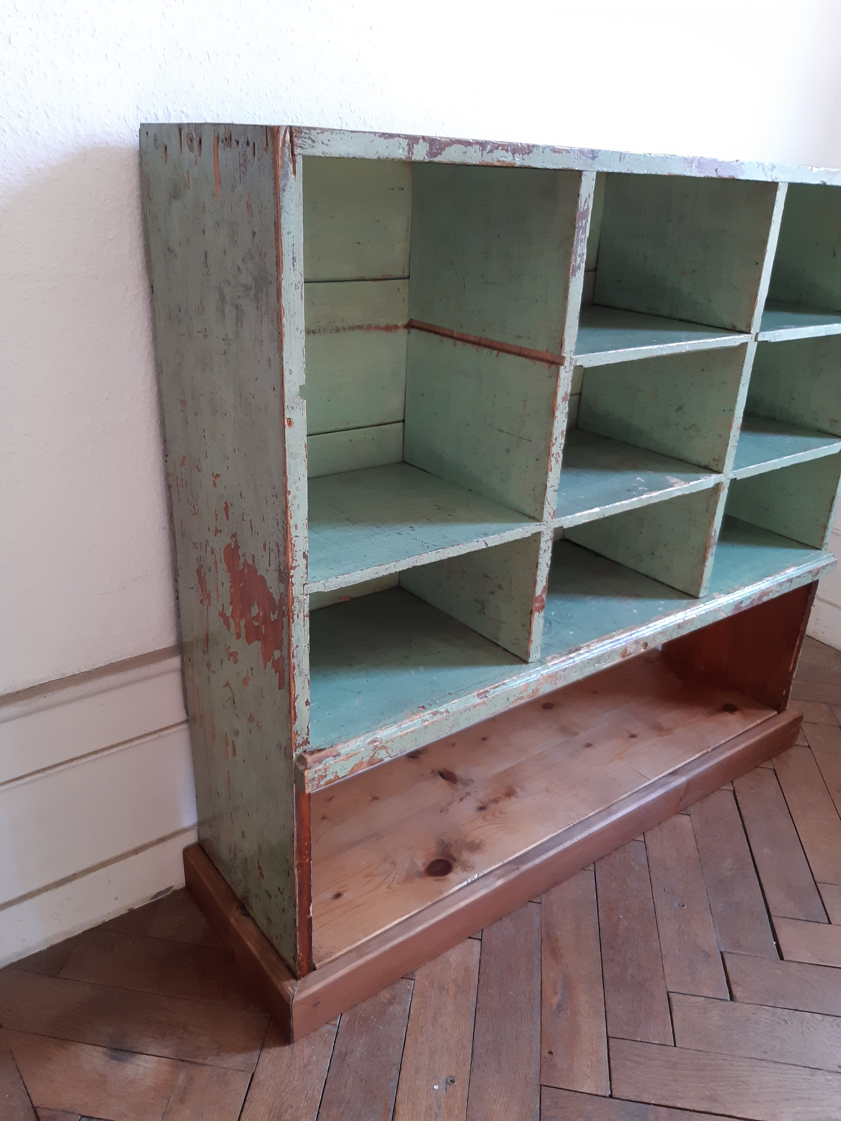 Old library shelf in patinated grocery tree