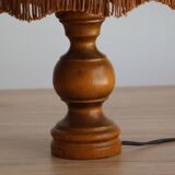 Table lamp in turned wood and umbrella-style leather lampshade