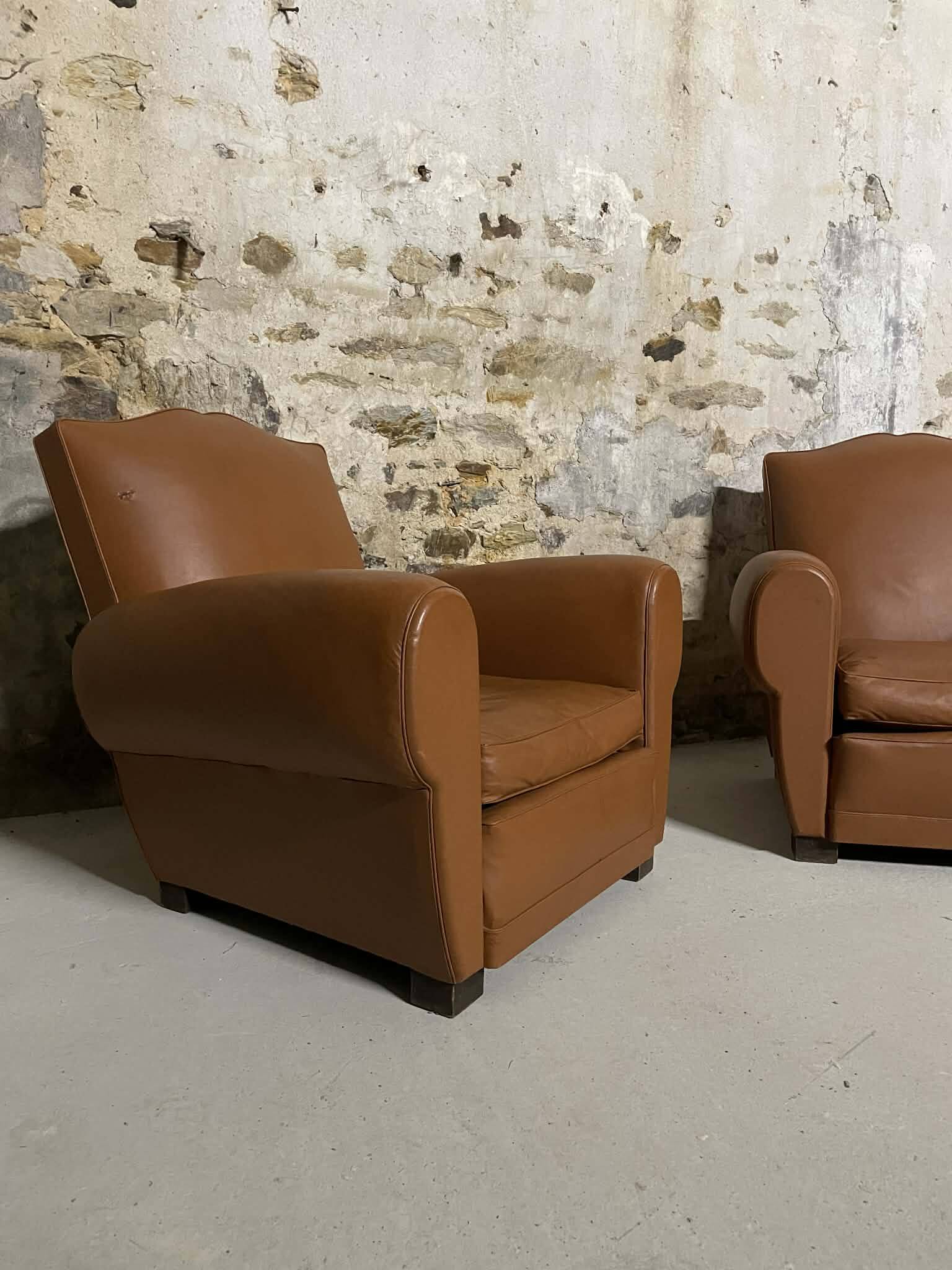 Pair of vintage club style armchairs in camel faux leather.