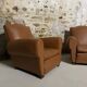 Pair of vintage club style armchairs in camel faux leather.