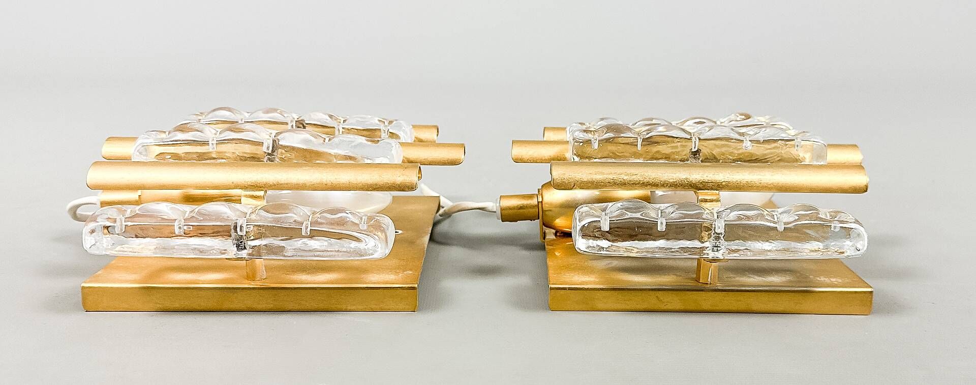 HANS AGNE JAKOBSSON. A pair of glass and brass wall lights