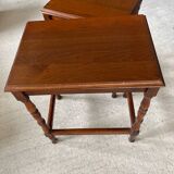 2 wooden nesting tables with molded legs